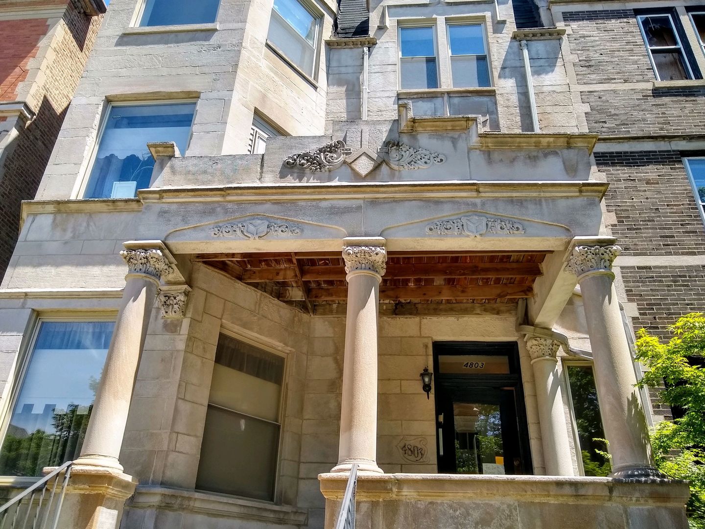 a view of building with glass windows