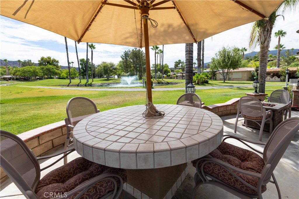 a view of a swimming pool with a patio