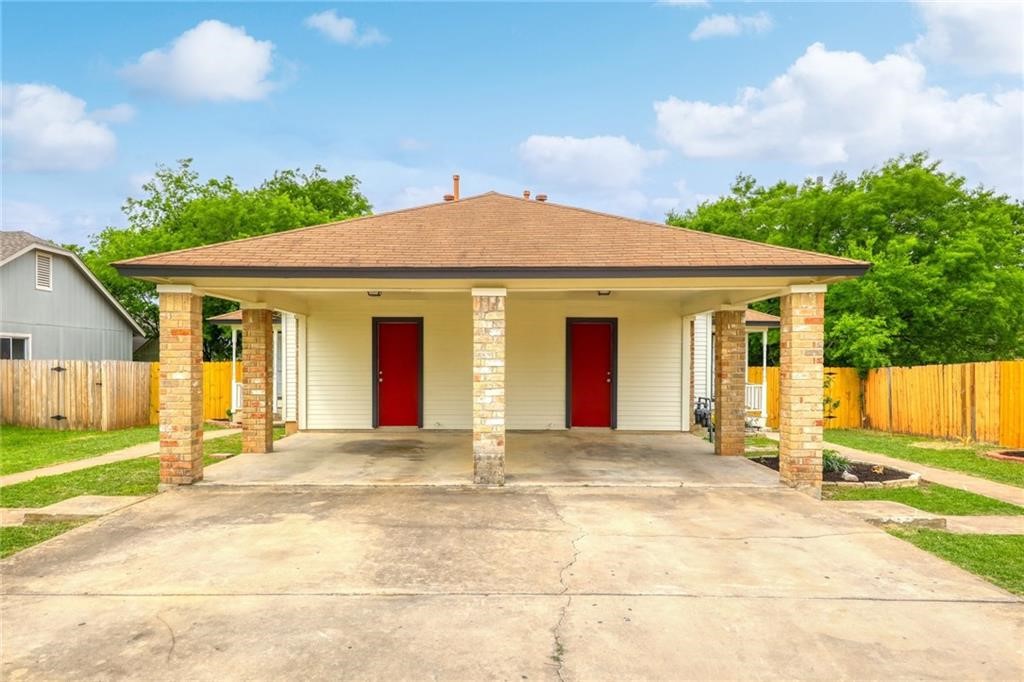 a front view of a house with a outdoor space