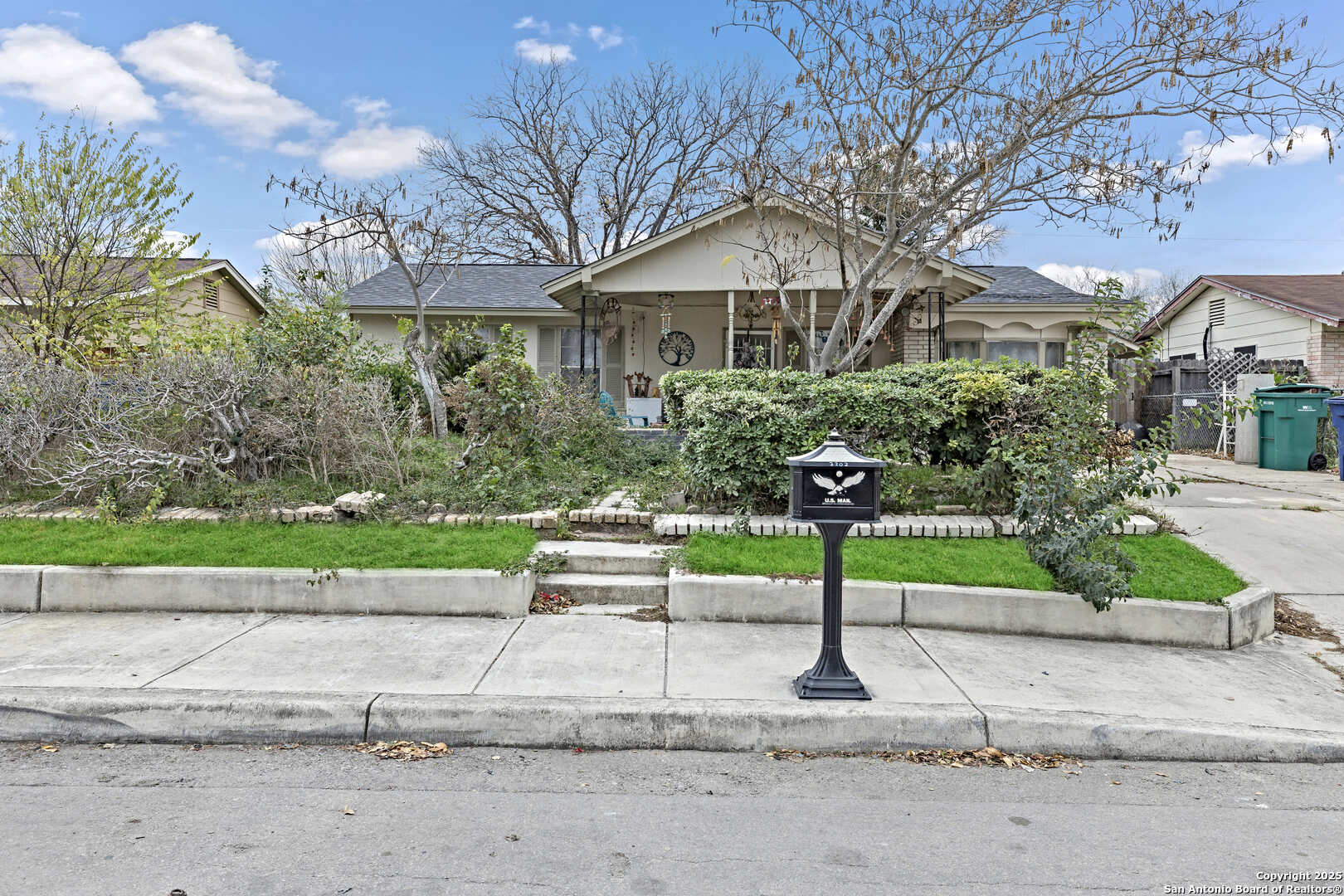 a view of a house with a street