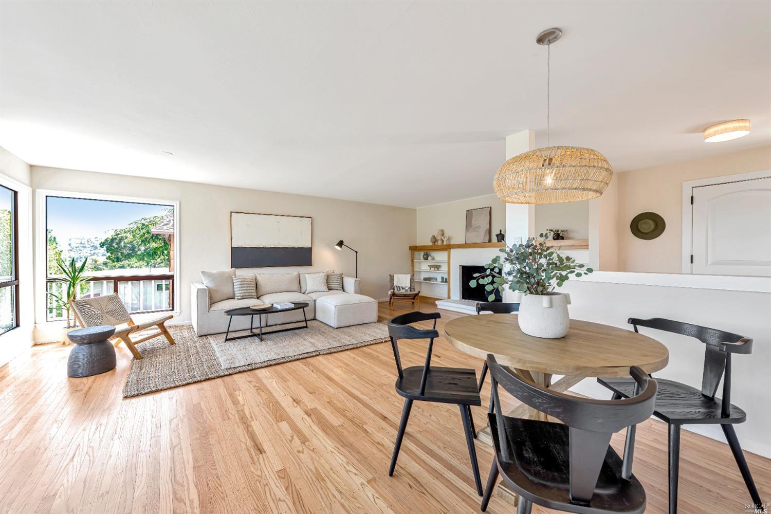 a living room with furniture and a table