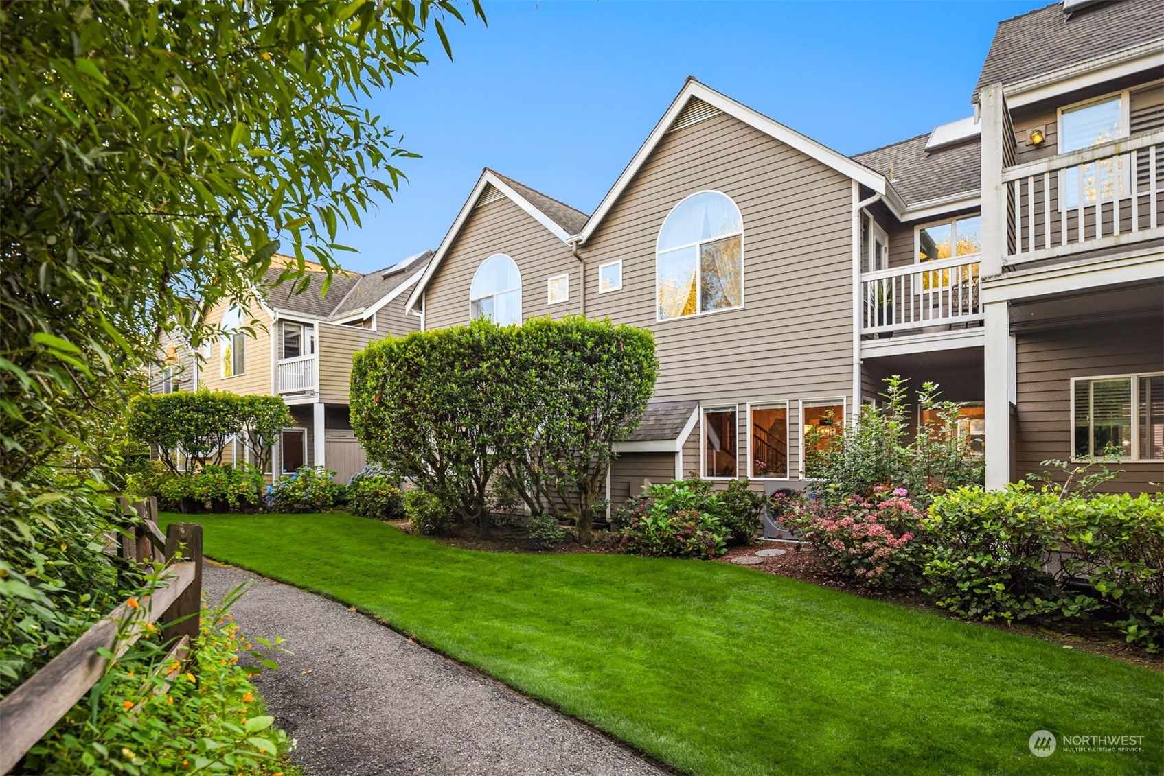 a front view of a house with garden