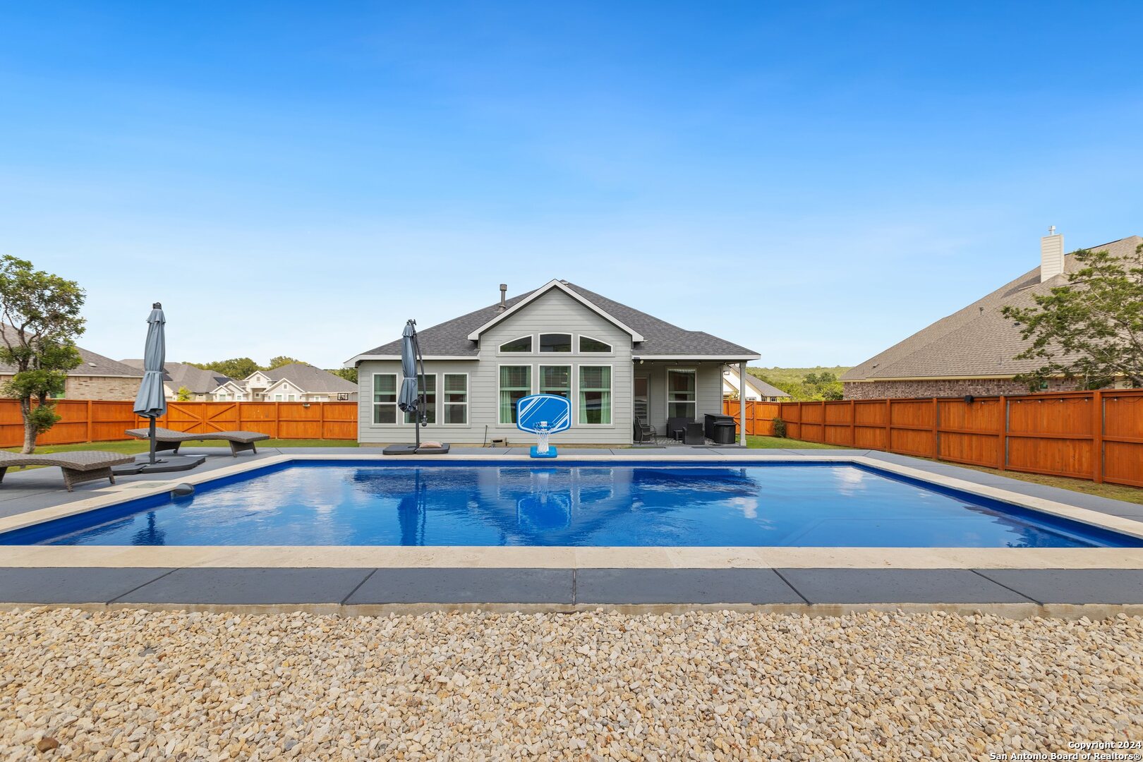 a view of a house with a swimming pool