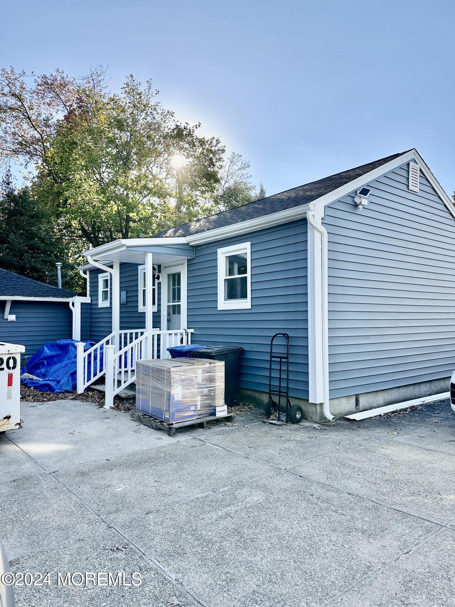 a view of a house with a yard and garage