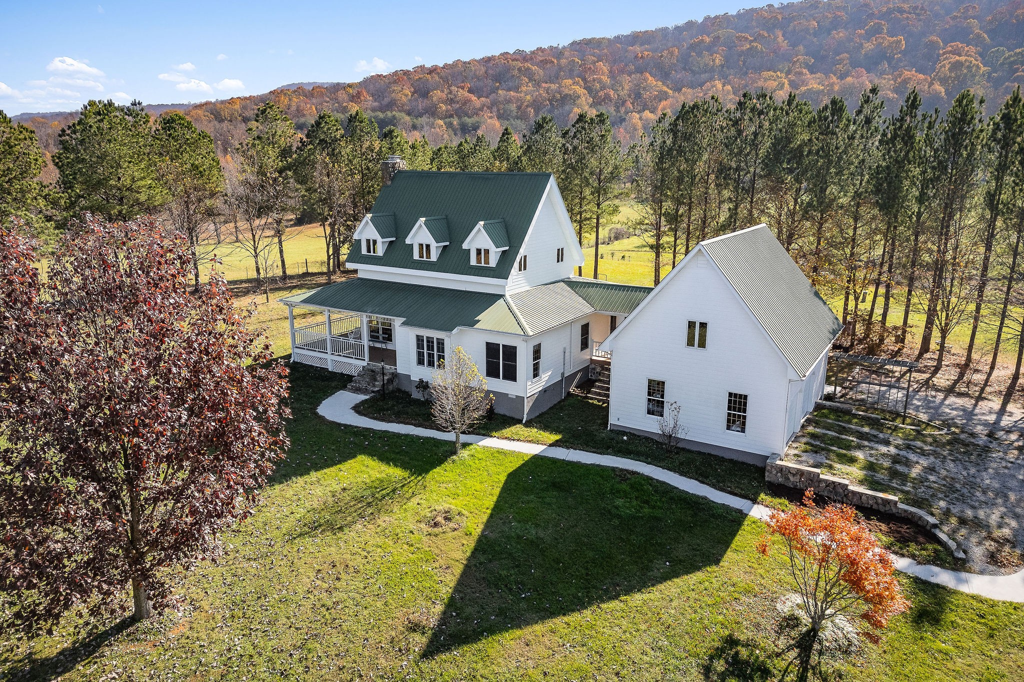 a view of a house with a yard