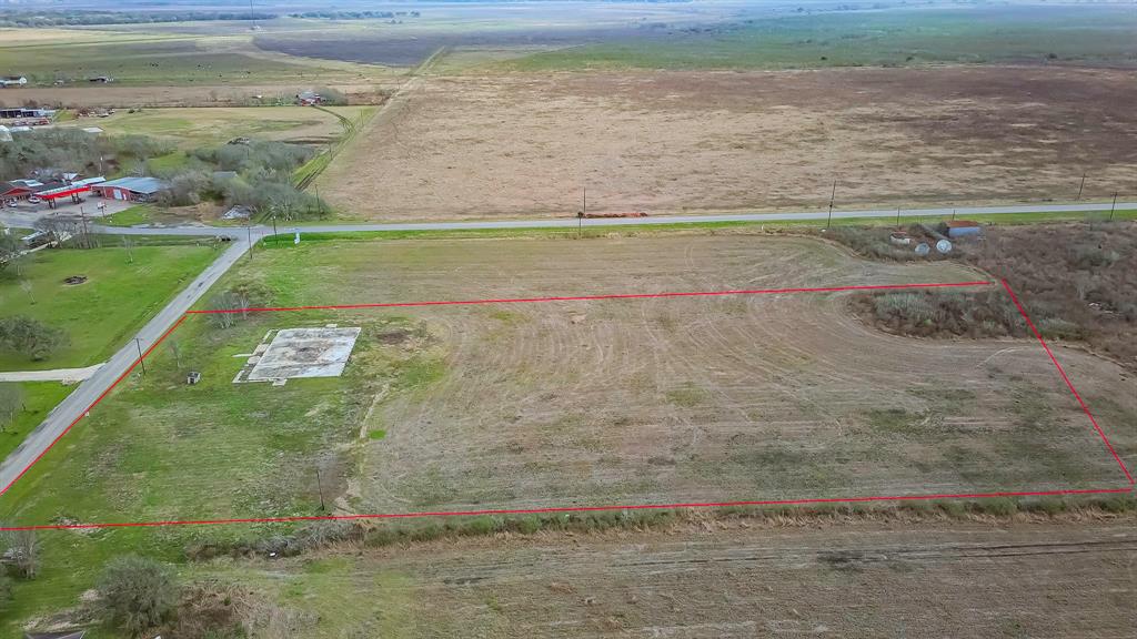 UNRESTRICTED ~4 acres of cleared land in the HEART OF SARGENT - just off FM 457 as you come into town - iIMAGINE the POSSIBILITIES with this property!   boundary lines are approximate and will need to be verified by the buyer