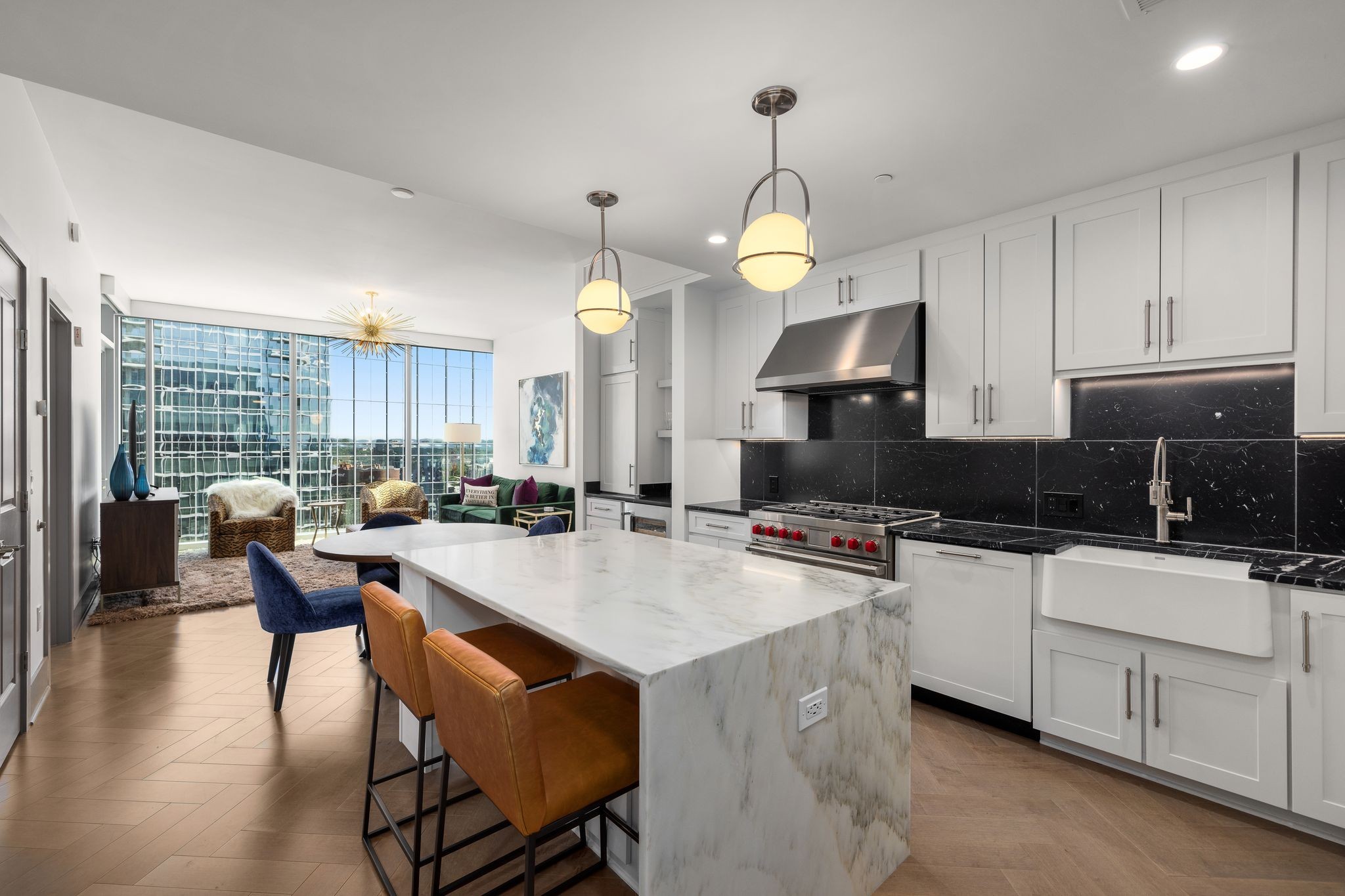 a kitchen with counter space appliances a sink and a center island