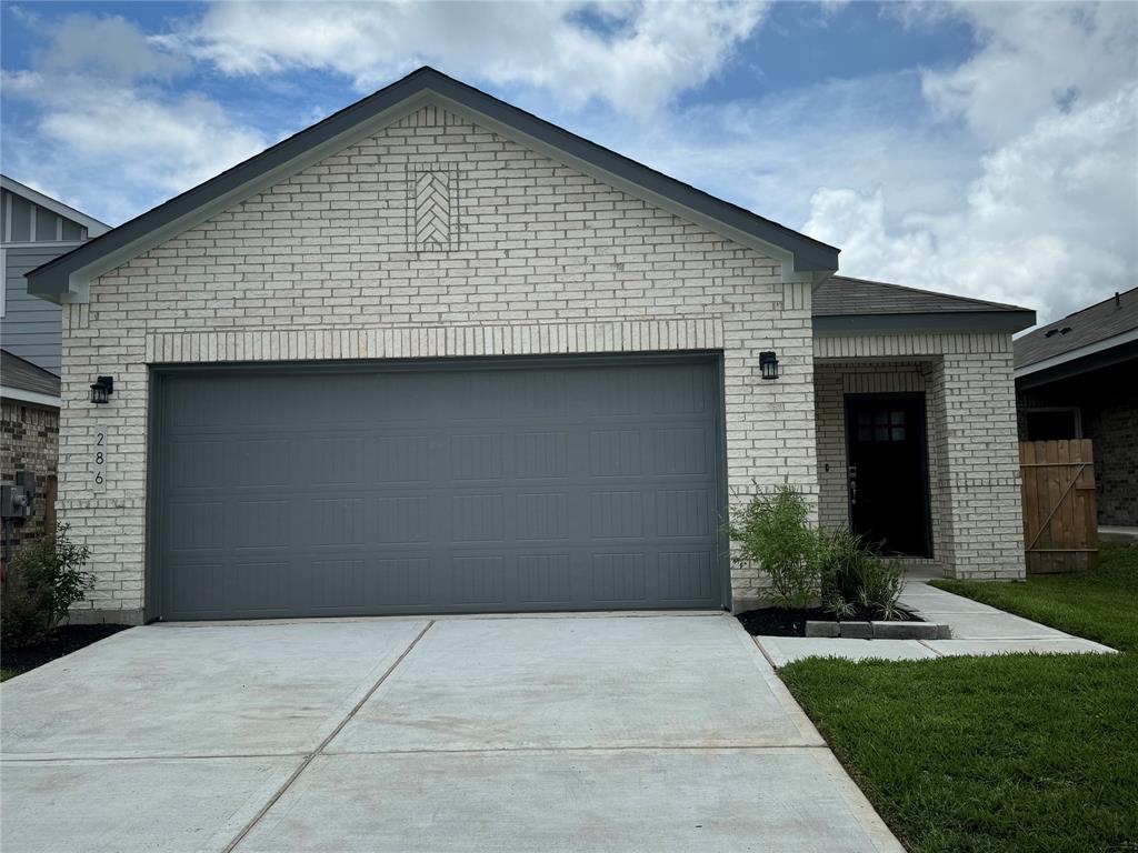 a front view of house with yard