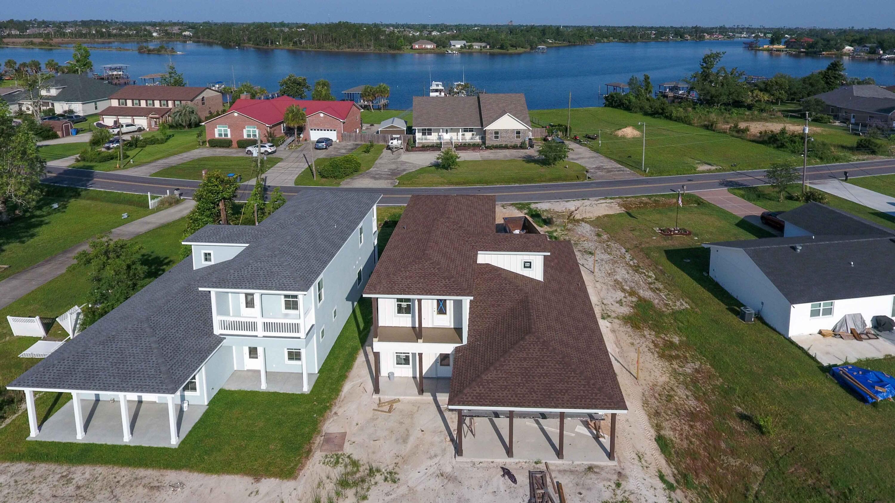 an aerial view of a house with outdoor space