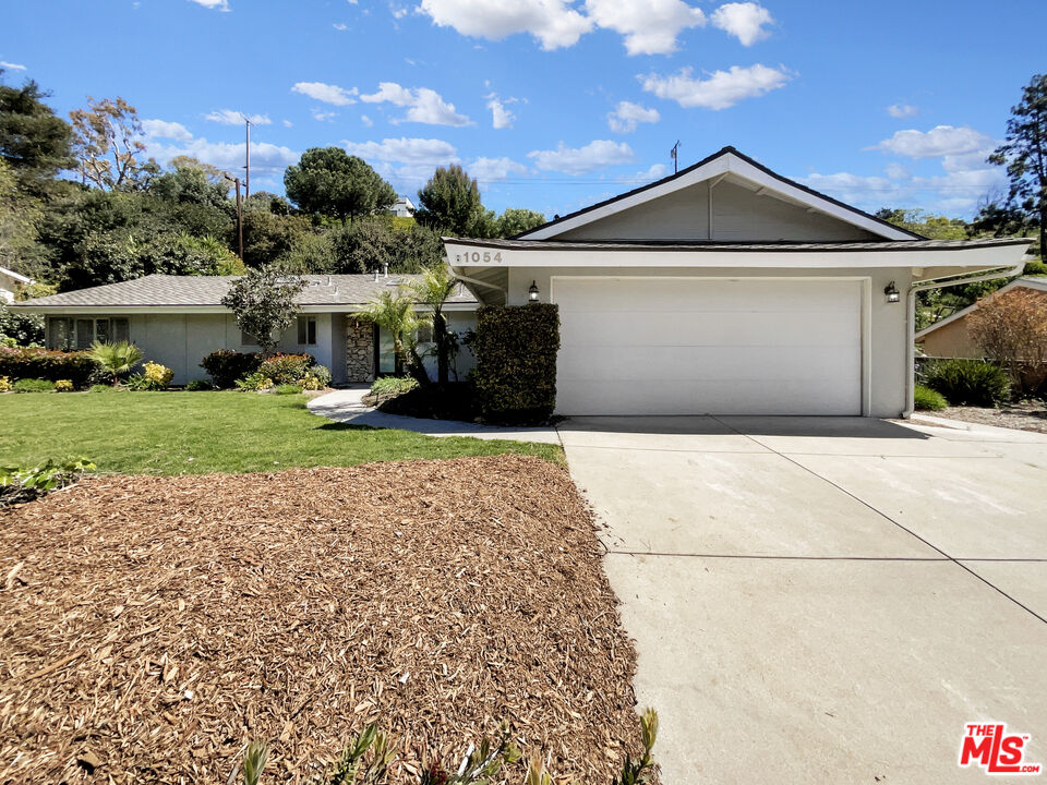 front view of house with a yard