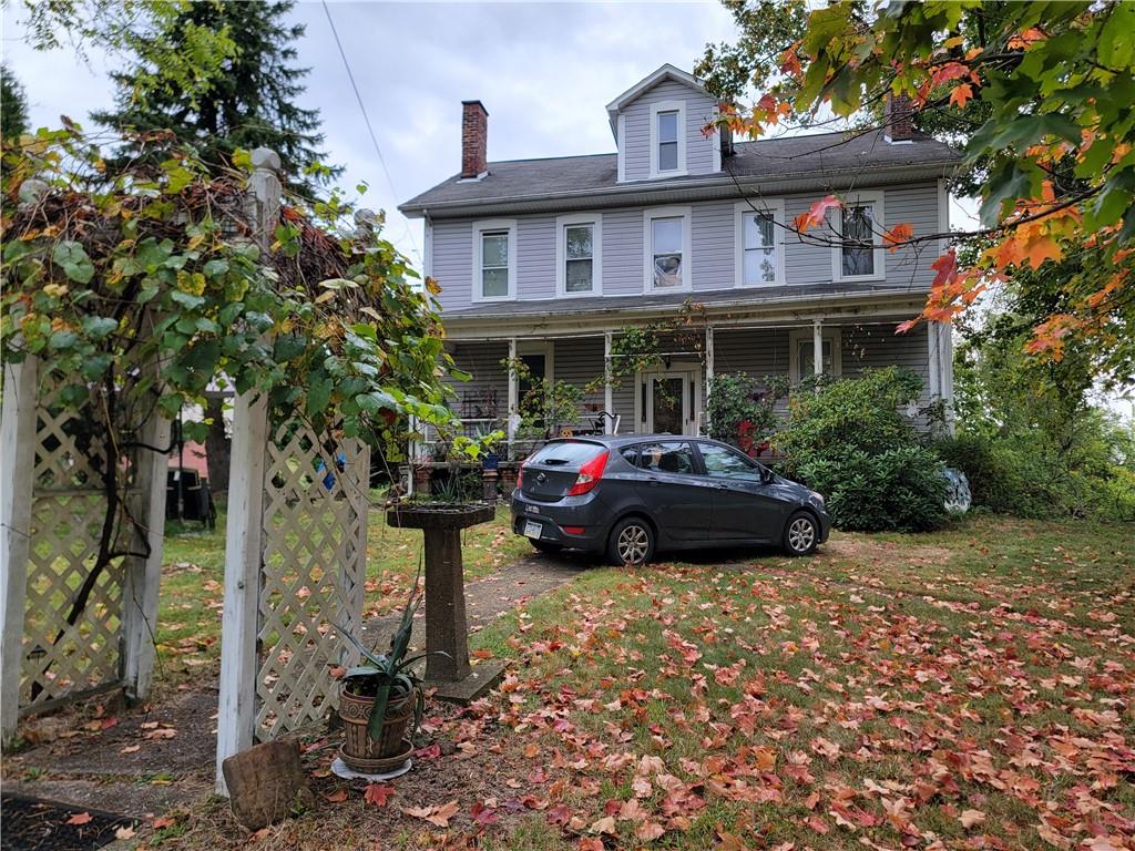 a car parked in front of a house