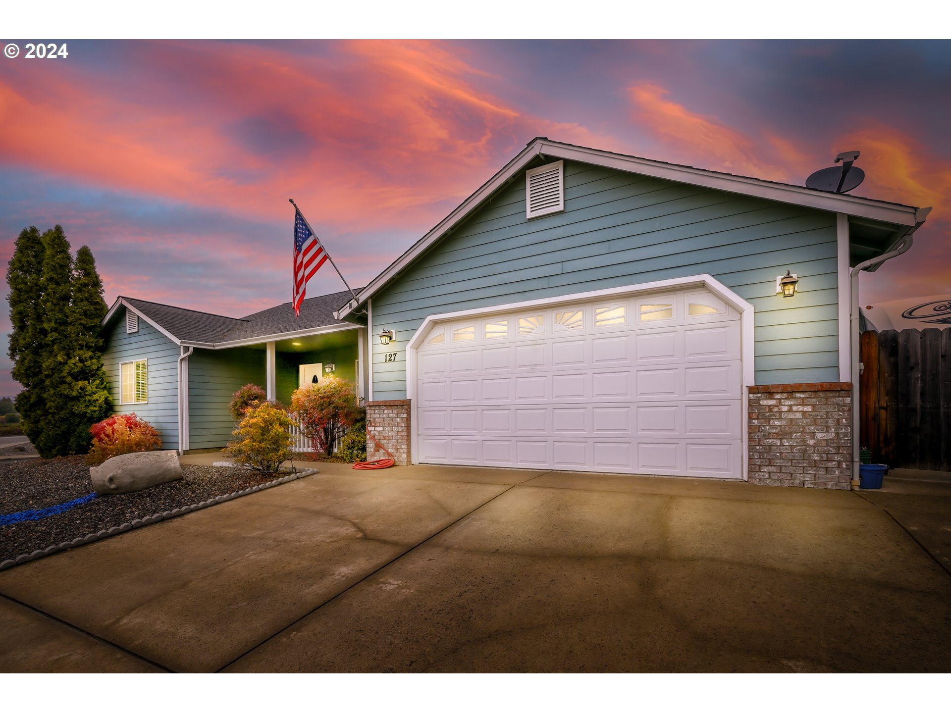 a front view of house with yard outdoor seating and entertaining space