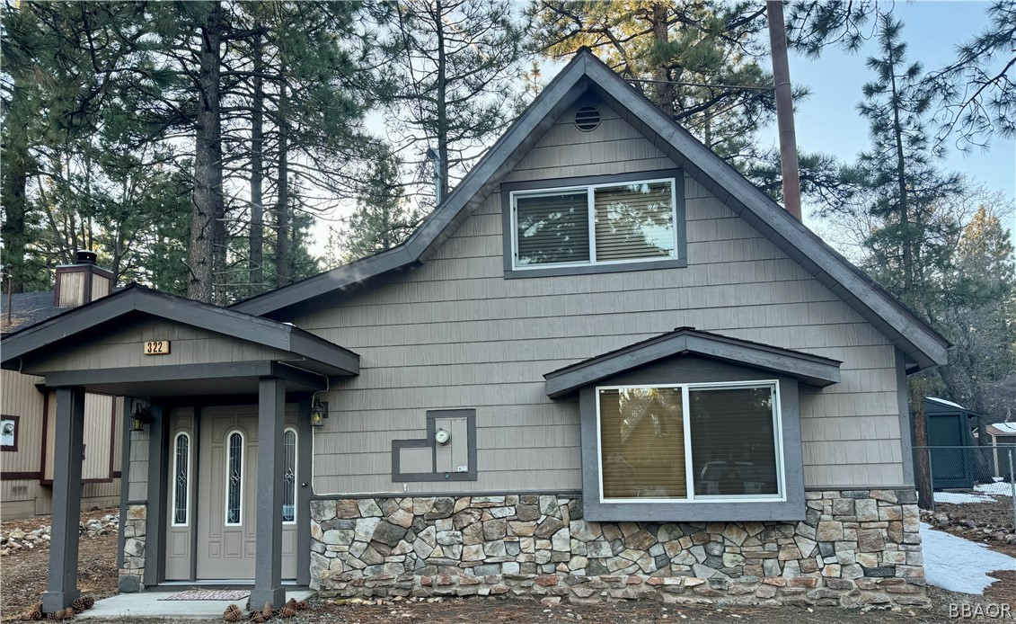 a front view of a house with a porch