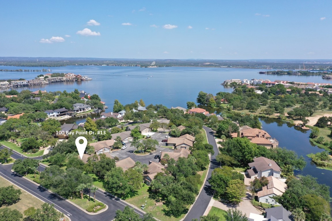 an aerial view of multiple house with outdoor space