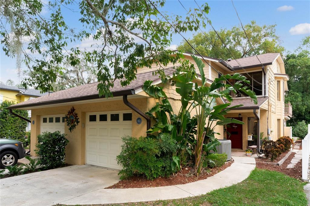 front view of a house with a yard