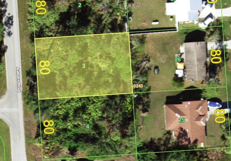 an aerial view of a residential houses with swimming pool