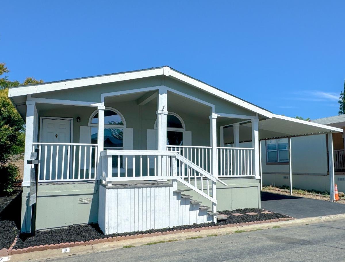 a view of a house with a porch