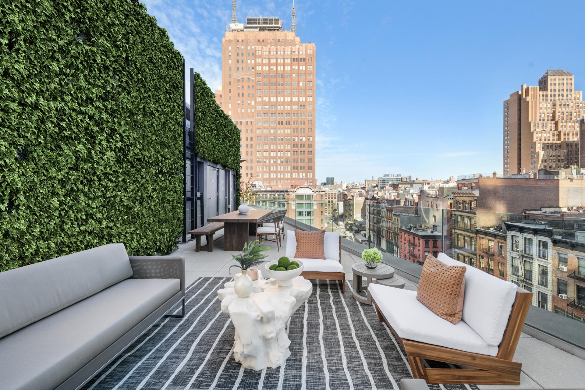 a view of roof deck with patio