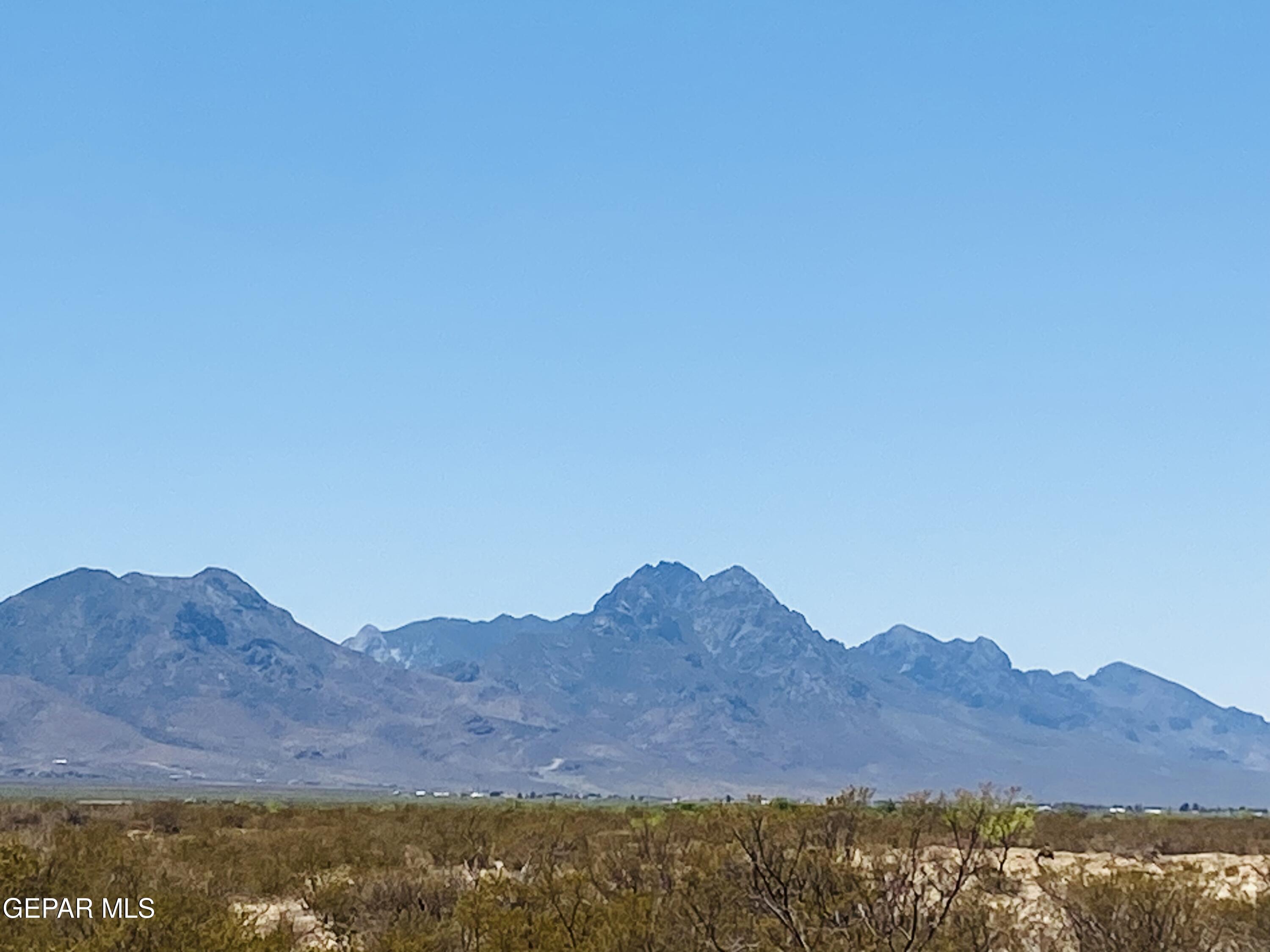 a view of mountains and a mountain