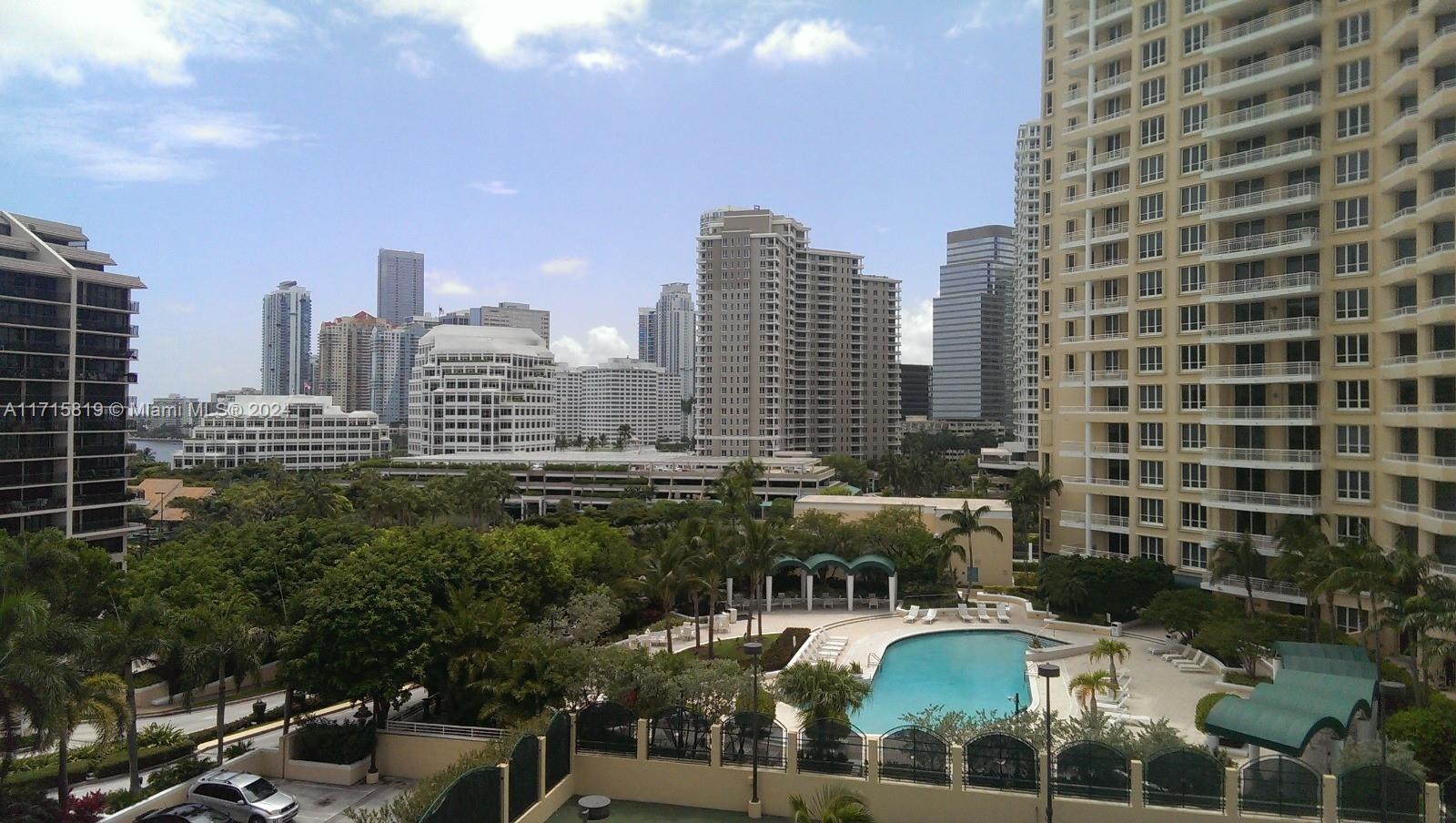 a view of a city with tall buildings