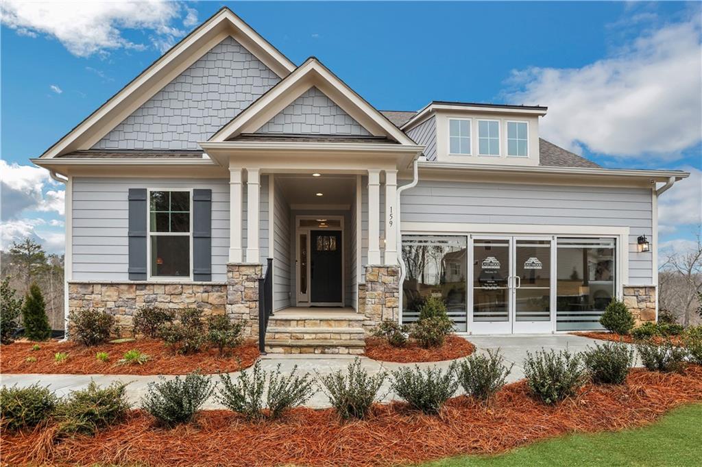 front view of a house with a yard