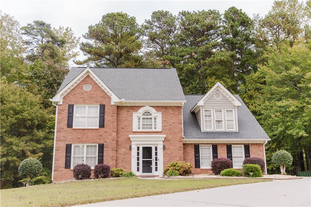 front view of house with a yard