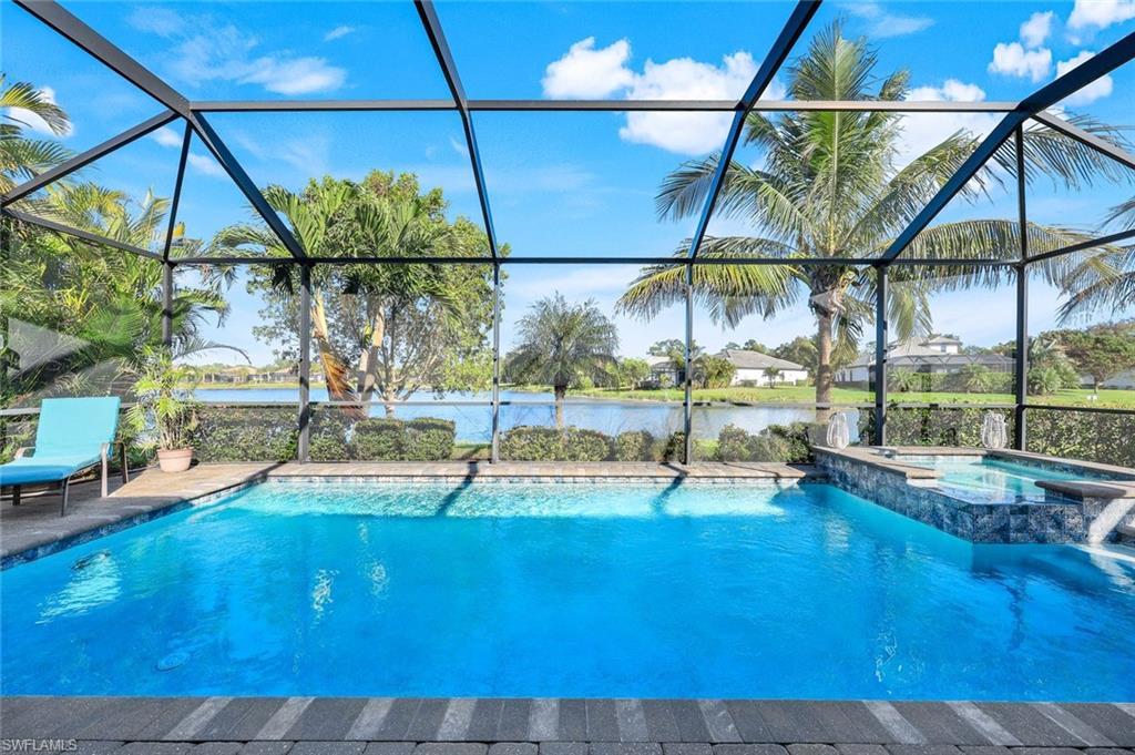 a view of a swimming pool with a patio