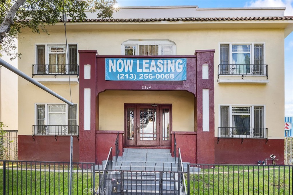 a front view of a house with a balcony