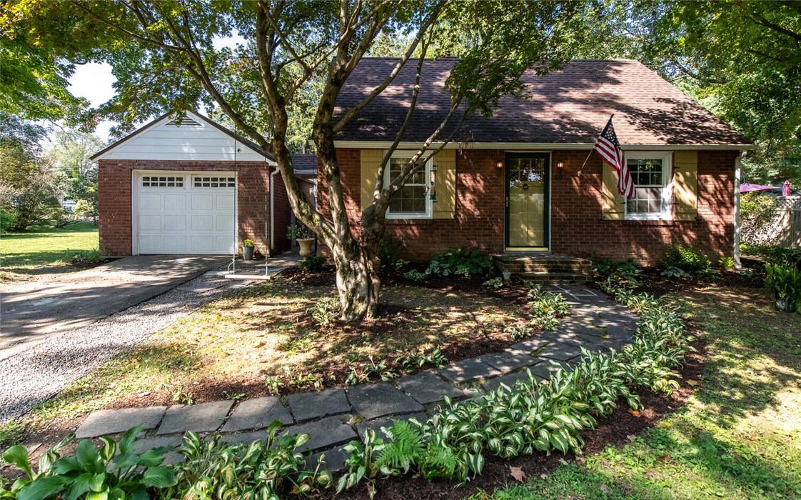 View of front of home featuring a garage