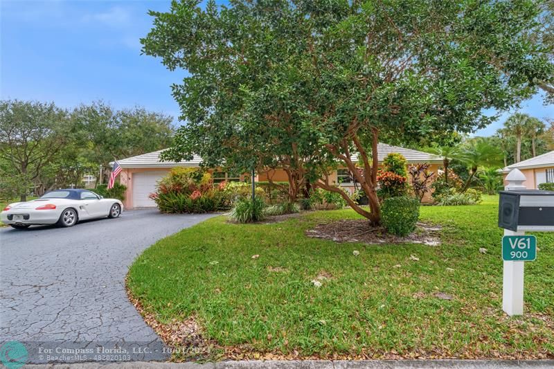 a view of a house with a back yard