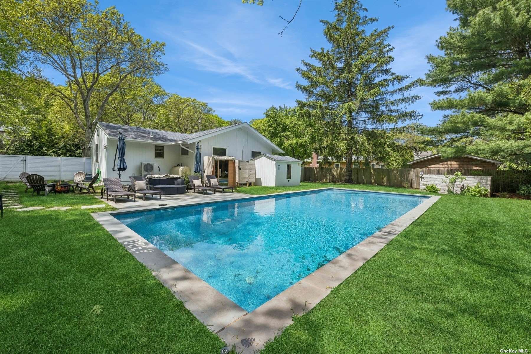 a view of a house with a swimming pool