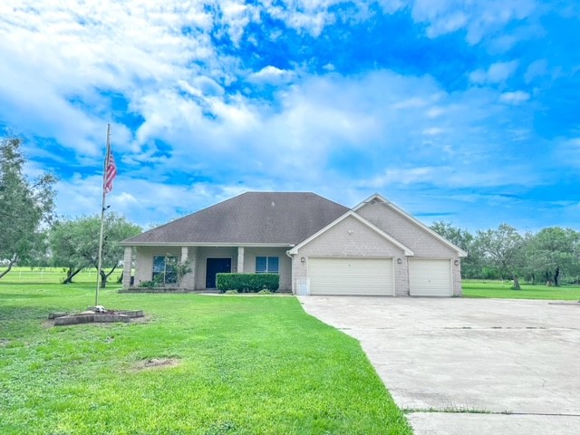 a view of house with garden