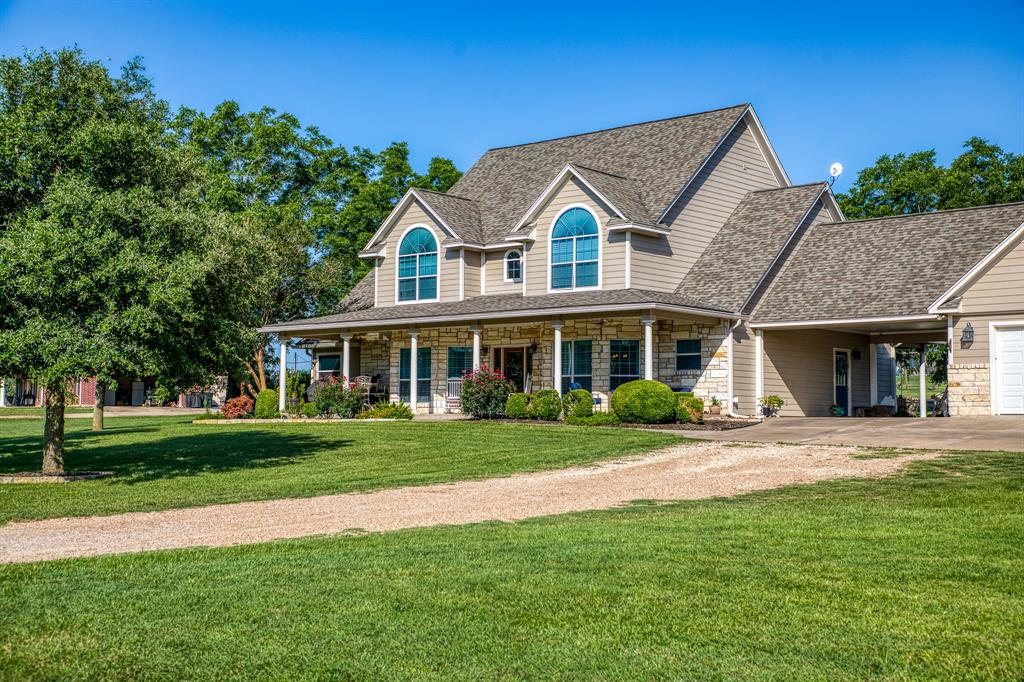 a view of a yard in front of a house