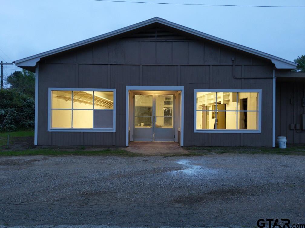 a view of empty room with windows