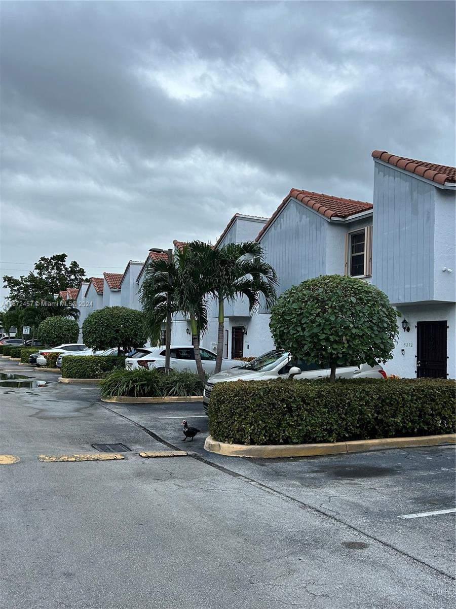 a view of a house with a street