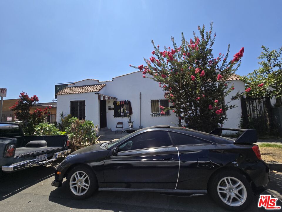 a car parked in front of a house