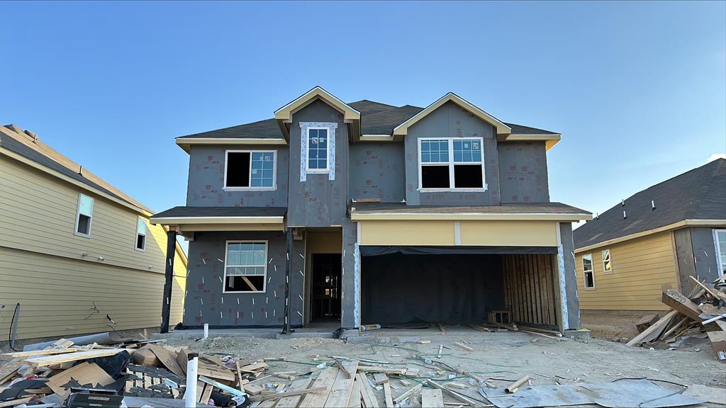 a front view of a house with yard