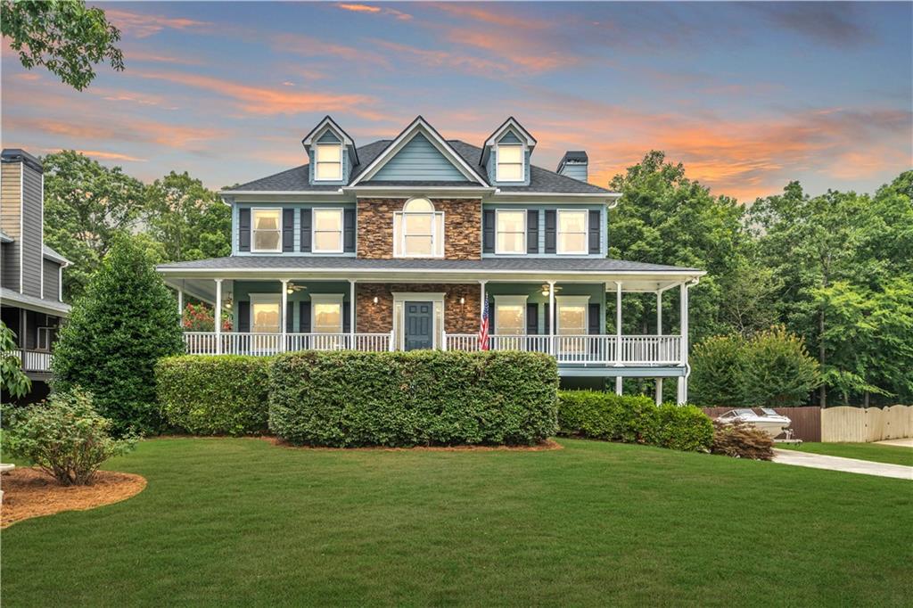 a front view of a house with a yard