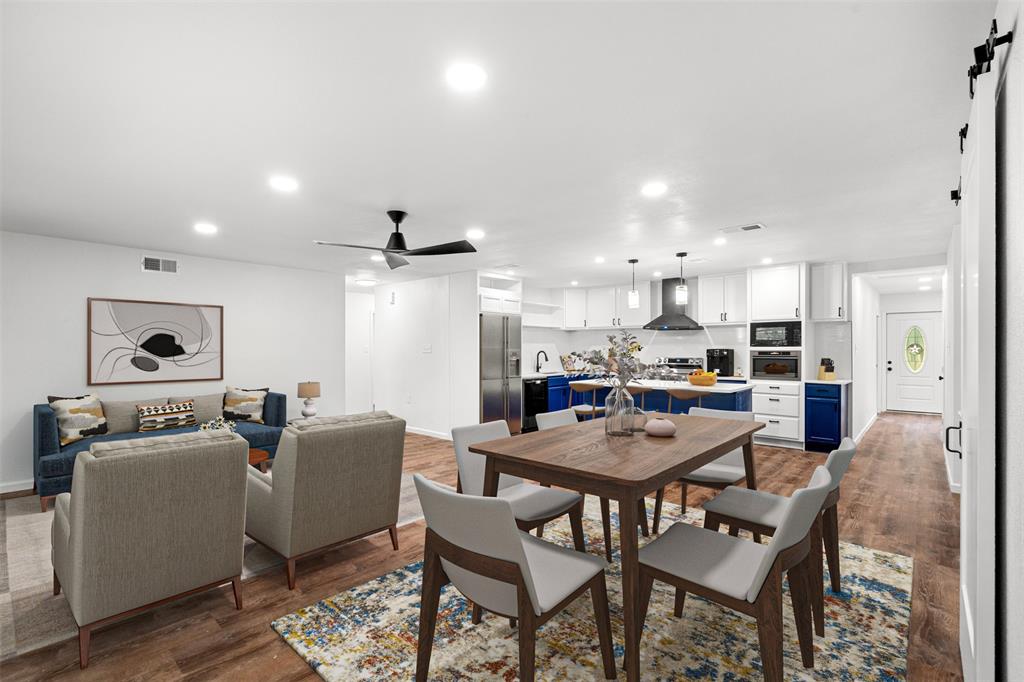 a dining room with furniture a window and kitchen view