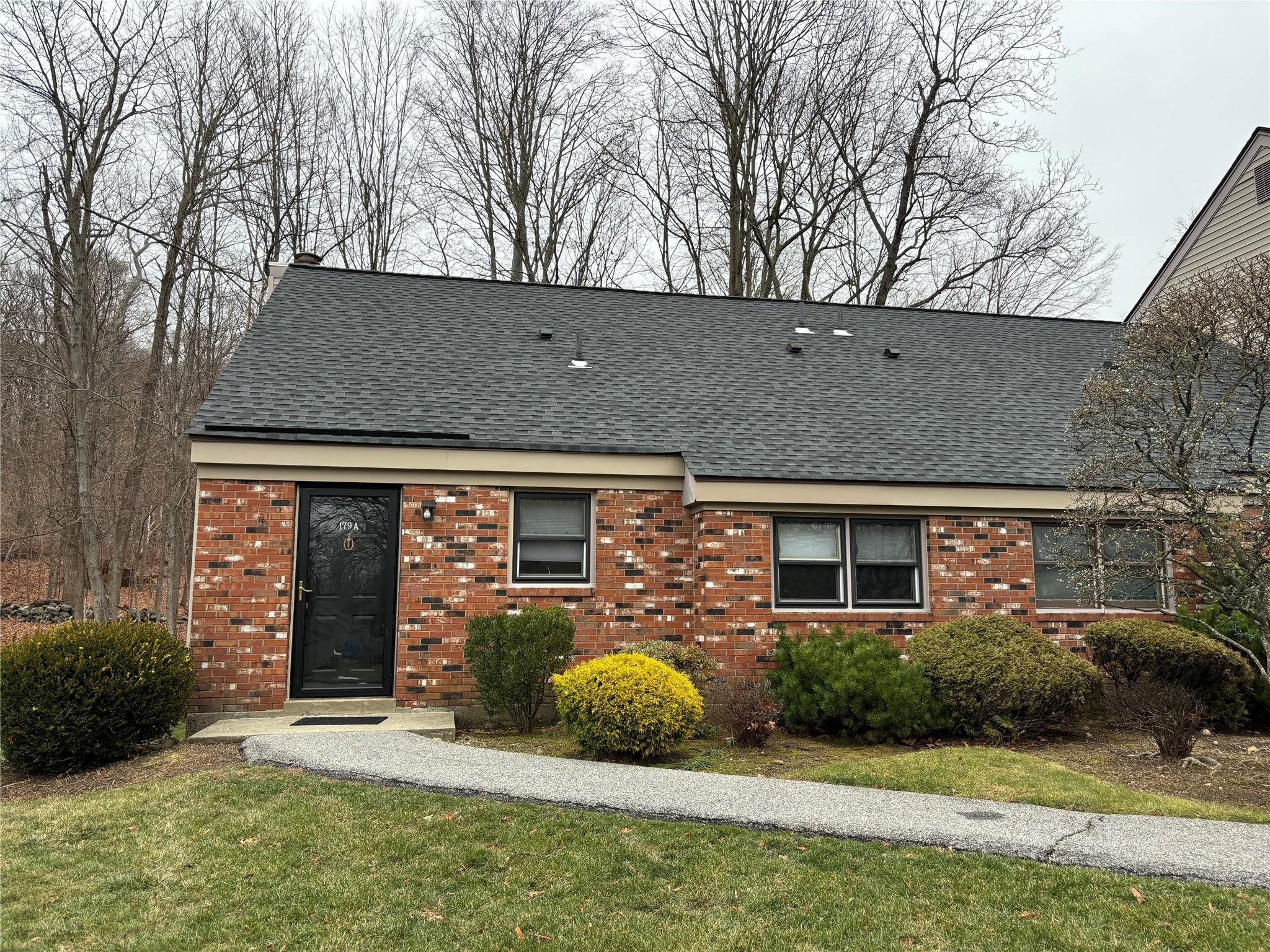 front view of house with a yard