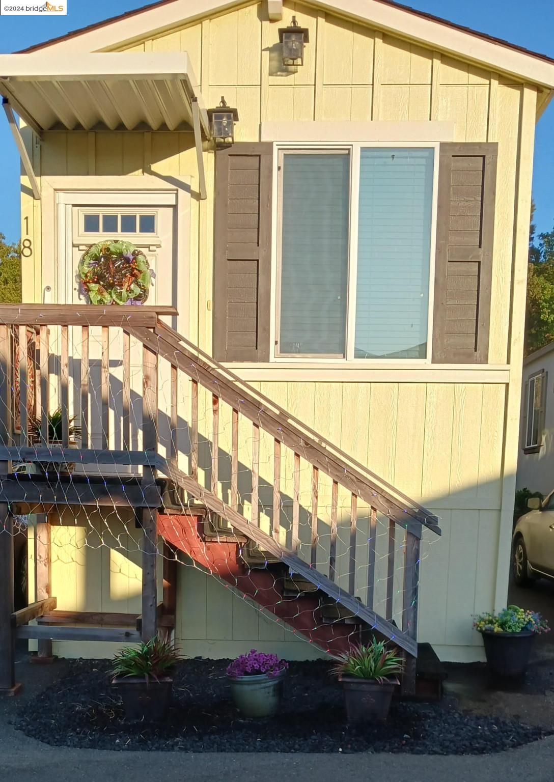 a view of a house with a street