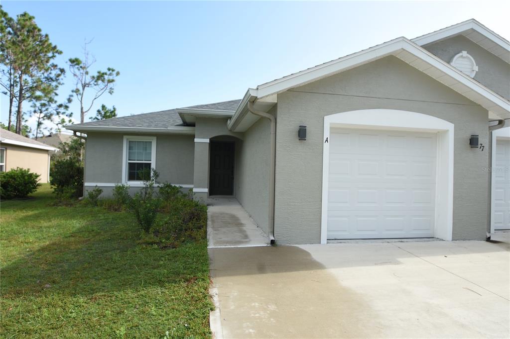 a front view of house with yard