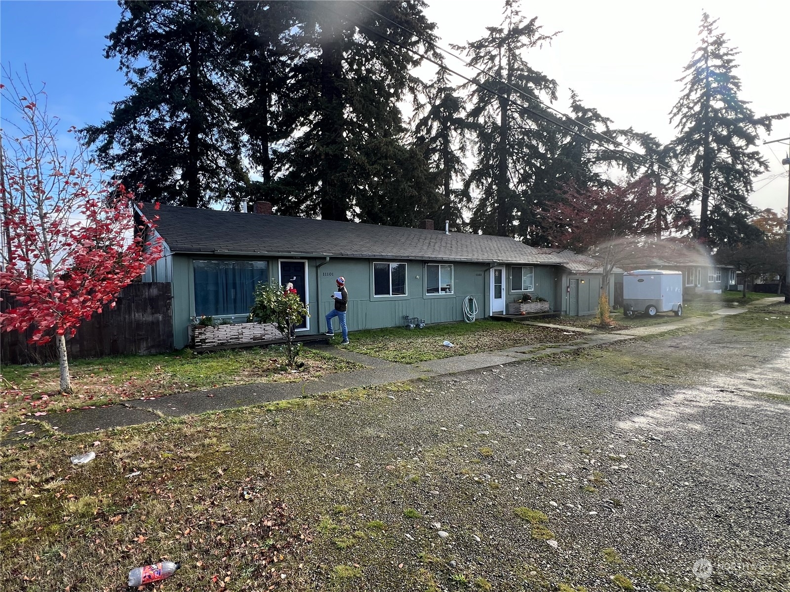 a view of a house with a yard