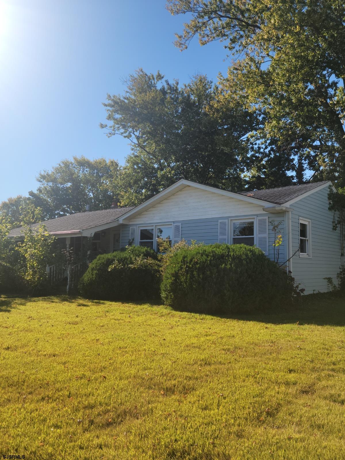 a view of house with ocean view