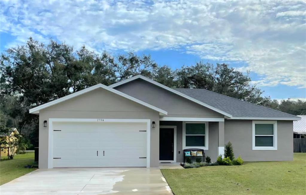 front view of house with a yard