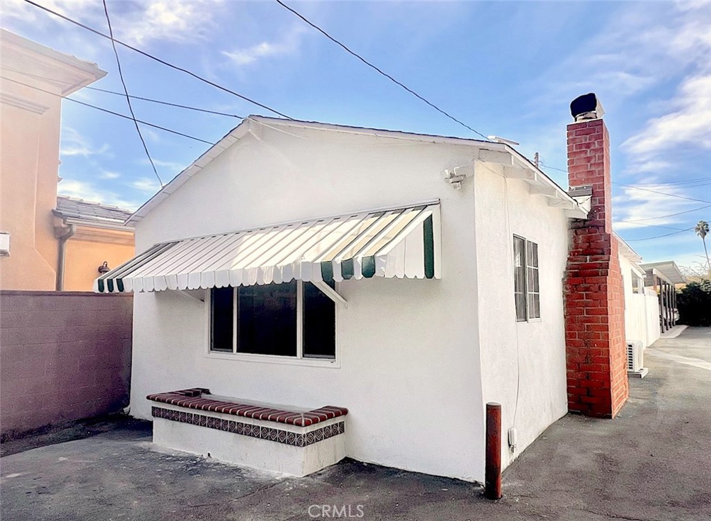 a ceiling fan in front of a house