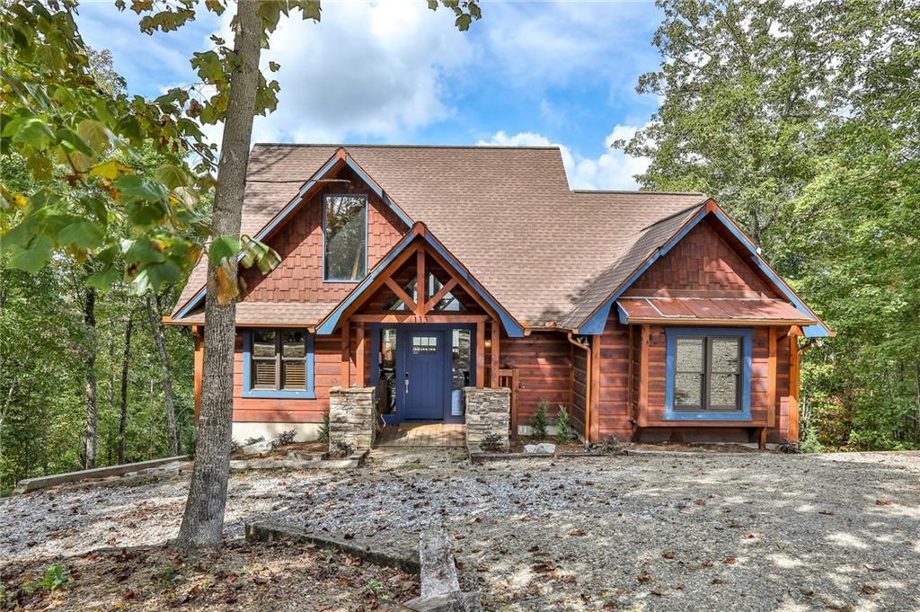 a house with trees in the background