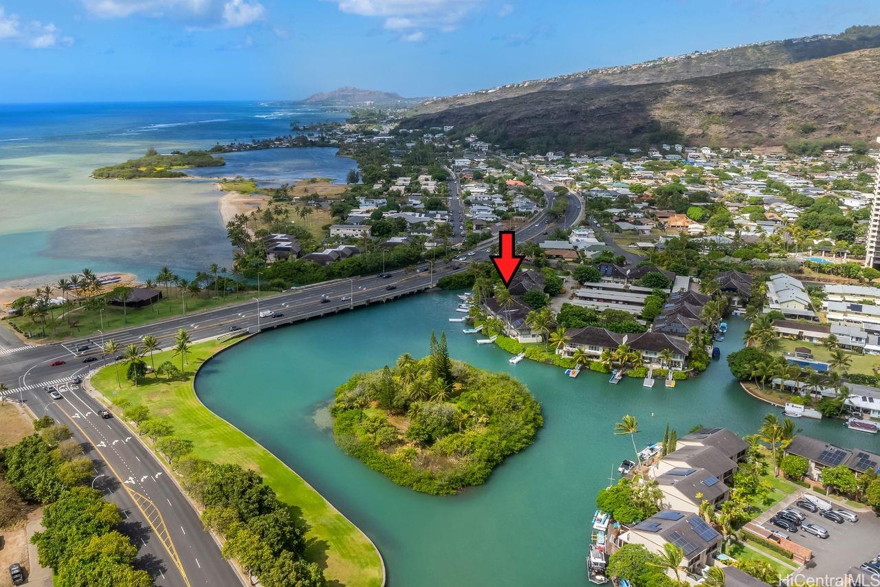 an aerial view of a house with a lake view