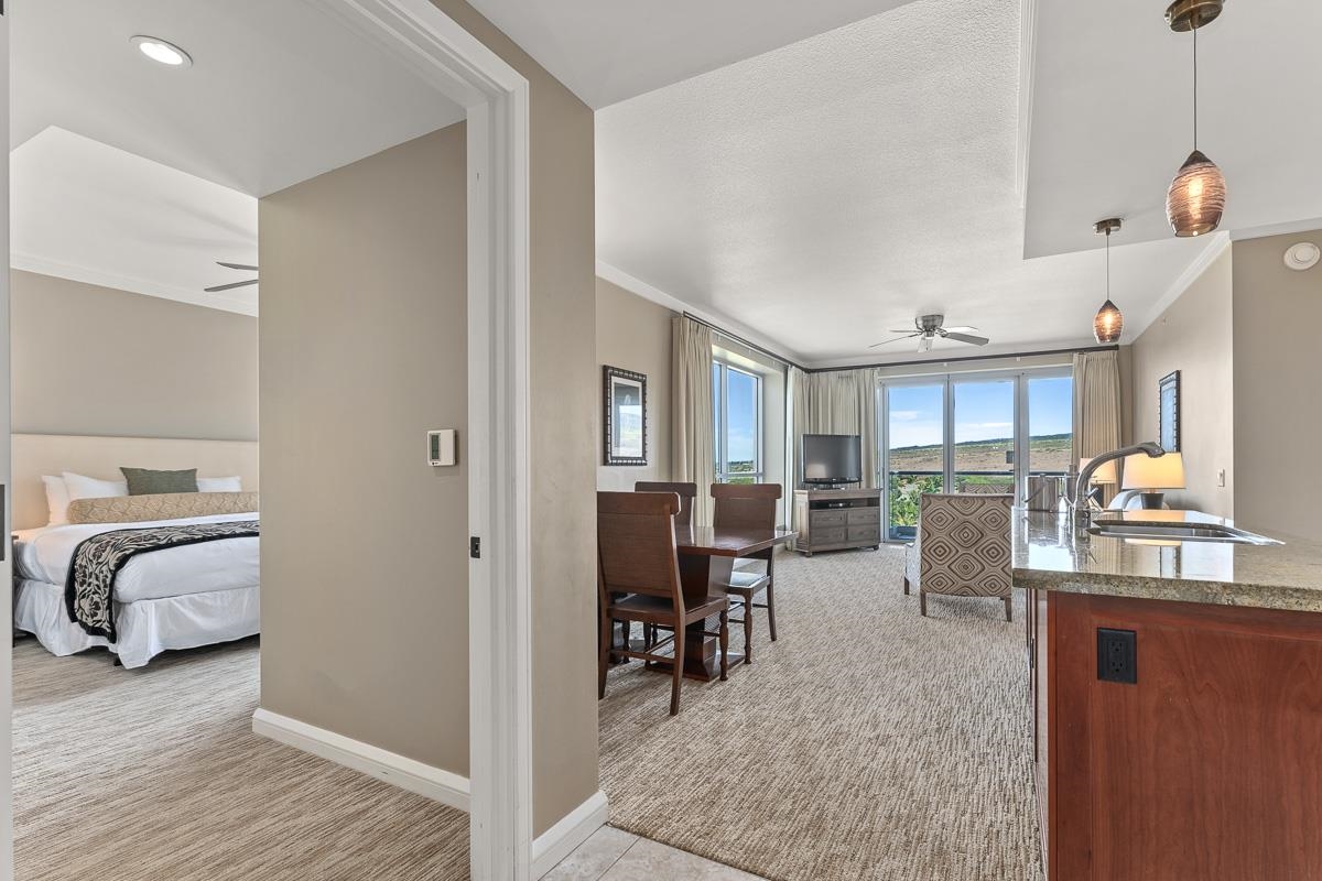 a view of kitchen with livingroom and furniture