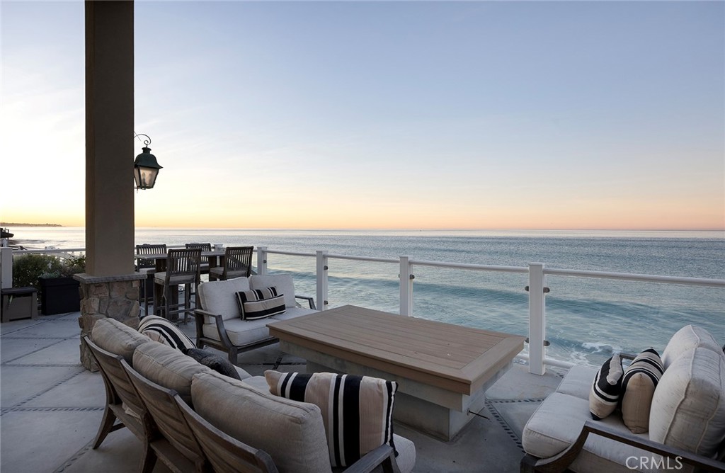 a terrace with a table and chairs